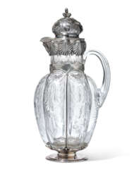 A PARCEL-GILT SILVER-MOUNTED CUT-GLASS DECANTER