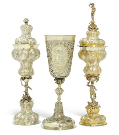 A PARCEL-GILT SILVER CHALICE AND TWO COVERED CUPS - фото 1
