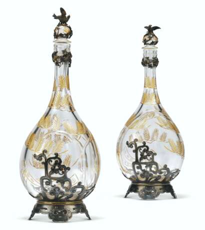 A PAIR OF FRENCH 'JAPONISME' SILVER-METAL MOUNTED GLASS DECANTERS  - photo 1