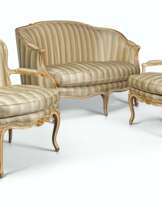 AN ASSEMBLED SET OF LOUIS XV CREAM-PAINTED AND PARCEL-GILT SEAT FURNITURE