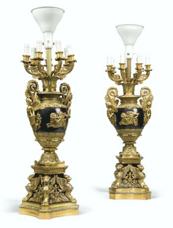 A PAIR OF FRENCH GILT AND PATINATED BRONZE EIGHT-LIGHT CANDELABRA - фото 1