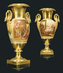 A PAIR OF PARIS PORCELAIN GOLD-GROUND TWO-HANDLED VASES