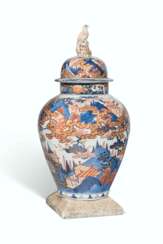 AN IMARI BALUSTER VASE AND COVER
