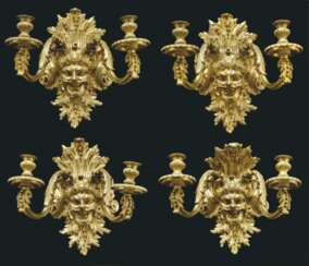 A SET OF FOUR FRENCH ORMOLU TWIN-LIGHT WALL-APPLIQUES