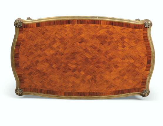 A PAIR OF FRENCH ORMOLU-MOUNTED MAHOGANY AND WALNUT PARQUETRY LOW TABLES - photo 2