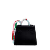 HERMÈS. A BLACK SWIFT LEATHER MICRO KELLY TWILLY CHARM WITH GOLD HARDWARE - photo 3