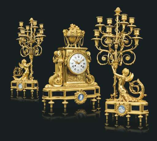 Beurdeley, Alfred. A FRENCH TOLE AND JASPERWARE-MOUNTED ORMOLU THREE-PIECE CLOC... - photo 1