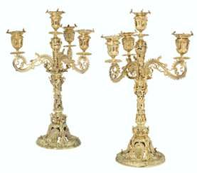 A PAIR OF VICTORIAN SCOTTISH SILVER-GILT FIVE-LIGHT CANDELAB...