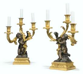 A PAIR OF RESTAURATION ORMOLU AND PATINATED-BRONZE THREE-LIG...