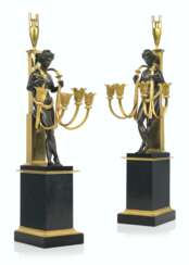 A PAIR OF EMPIRE ORMOLU, PATINATED-BRONZE AND BLACK MARBLE F...