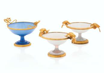 A GROUP OF THREE CHARLES X ORMOLU AND OPLAINE GLASS TAZZE