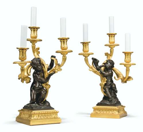 A PAIR OF FRENCH ORMOLU AND PATINATED-BRONZE THREE-LIGHT CAN... - photo 1