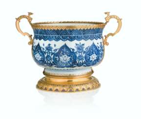 A NORTH EUROPEAN ORMOLU-MOUNTED CHINESE BLUE-AND-WHITE PORCE...
