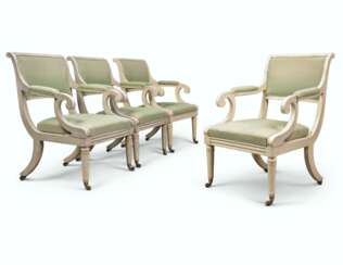 A SET OF FOUR REGENCY WHITE-PAINTED OPEN ARMCHAIRS