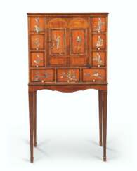 A GEORGE III CHINESE SOAPSTONE-MOUNTED SATINWOOD CABINET-ON-...