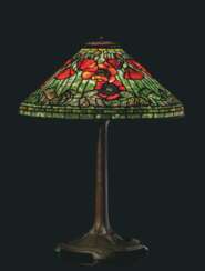 A 'POPPY' PATINATED BRONZE AND LEADED GLASS TABLE LAMP