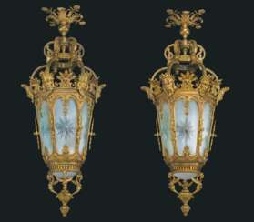 A PAIR OF MONUMENTAL ORMOLU AND FROSTED GLASS LANTERNS