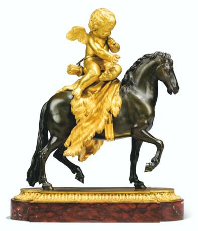 A CHARLES X ORMOLU, PATINATED-BRONZE AND RED MARBLE EQUESTRI... - Foto 1