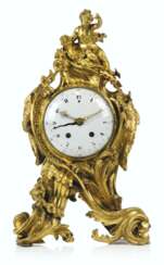 A LOUIS XV ORMOLU MANTEL CLOCK