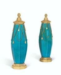 A PAIR OF FRENCH ORMOLU-MOUNTED TURQUOISE-GROUND PORCELAIN VASES AND COVERS