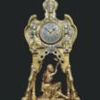 A FRENCH 'ORIENTALIST' GILT AND SILVERED-BRONZE MANTLE CLOCK - Auction prices