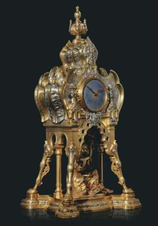 A FRENCH 'ORIENTALIST' GILT AND SILVERED-BRONZE MANTLE CLOCK - фото 2