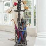 A SWISS 'BLACK FOREST' STAINED WALNUT AND PINE COAT RACK AND UMBRELLA STAND - фото 1