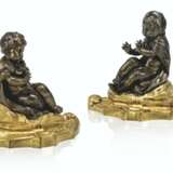 A PAIR OF FRENCH ORMOLU AND PATINATED-BRONZE PRESSE-PAPIERS - фото 1