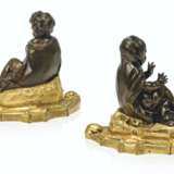 A PAIR OF FRENCH ORMOLU AND PATINATED-BRONZE PRESSE-PAPIERS - photo 2