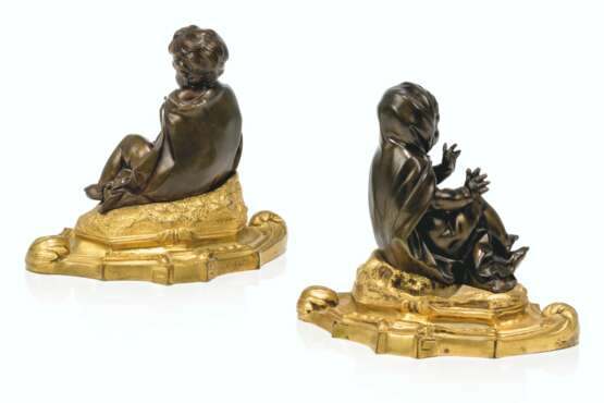 A PAIR OF FRENCH ORMOLU AND PATINATED-BRONZE PRESSE-PAPIERS - photo 2
