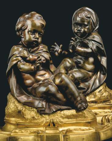 A PAIR OF FRENCH ORMOLU AND PATINATED-BRONZE PRESSE-PAPIERS - photo 4