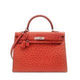 HERMÈS. A ROUGE VIF OSTRICH SELLIER KELLY 35 WITH PALLADIUM HARDWARE - фото 1