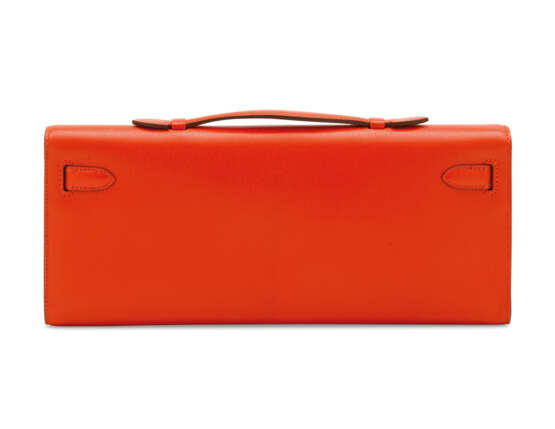 HERMÈS. A CAPUCINE CHÈVRE LEATHER KELLY CUT WITH PALLADIUM HARDWARE - photo 3