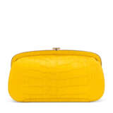 CHANEL. A MATTE YELLOW ALLIGATOR OVERSIZE CLUTCH WITH BRONZE HARDWARE - фото 3