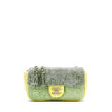CHANEL. A LIME SEQUIN MINI SINGLE FLAP WITH SILVER HARDWARE - photo 1