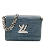 LOUIS VUITTON. A SHINY LIGHT BLUE POROSUS CROCODILE TWIST WITH SILVER HARDWARE - photo 1