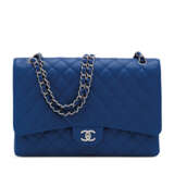 CHANEL. A BLUE CAVIAR LEATHER MAXI SINGLE FLAP BAG WITH SILVER HARDWARE - photo 1