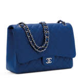 CHANEL. A BLUE CAVIAR LEATHER MAXI SINGLE FLAP BAG WITH SILVER HARDWARE - photo 3