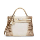 HERMÈS. A RARE, MATTE WHITE NILOTICUS CROCODILE RETOURNÉ KELLY 32 WITH PALLADIUM HARDWARE - фото 1