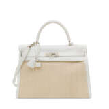 HERMÈS. A WHITE CLÉMENCE LEATHER & TOILE RETOURNÉ KELLY 35 WITH PALLADIUM HARDWARE - photo 1