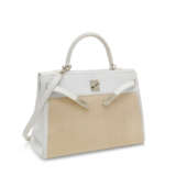 HERMÈS. A WHITE CLÉMENCE LEATHER & TOILE RETOURNÉ KELLY 35 WITH PALLADIUM HARDWARE - photo 2