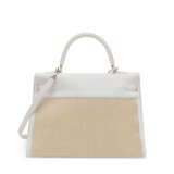 HERMÈS. A WHITE CLÉMENCE LEATHER & TOILE RETOURNÉ KELLY 35 WITH PALLADIUM HARDWARE - photo 3