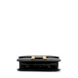 HERMÈS. A SHINY BLACK POROSUS CROCODILE CONSTANCE 23 WITH GOLD HARDWARE - фото 4