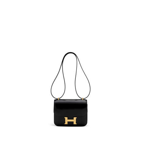 HERMÈS. A BLACK CALF BOX LEATHER MINI CONSTANCE 18 WITH GOLD HARDWARE - photo 1