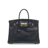 HERMÈS. A SHINY BLACK POROSUS CROCODILE BIRKIN 35 WITH GOLD HARDWARE - фото 1