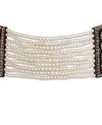 Halsband. EARLY 20TH CENTURY SEED PEARL, RUBY AND DIAMOND CHOKER NECKLACE