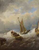 Drei Boote bei stürmischem Wetter an der Mole