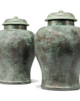 A PAIR OF SIMULATED-VERDIGRIS URNS AND COVERS