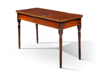 A NORTH EUROPEAN BRASS-MOUNTED MAHOGANY SIDE TABLE