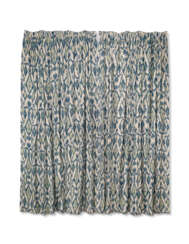 A PAIR OF BLUE, WHITE AND YELLOW IKAT PATTERN COTTON CURTAINS